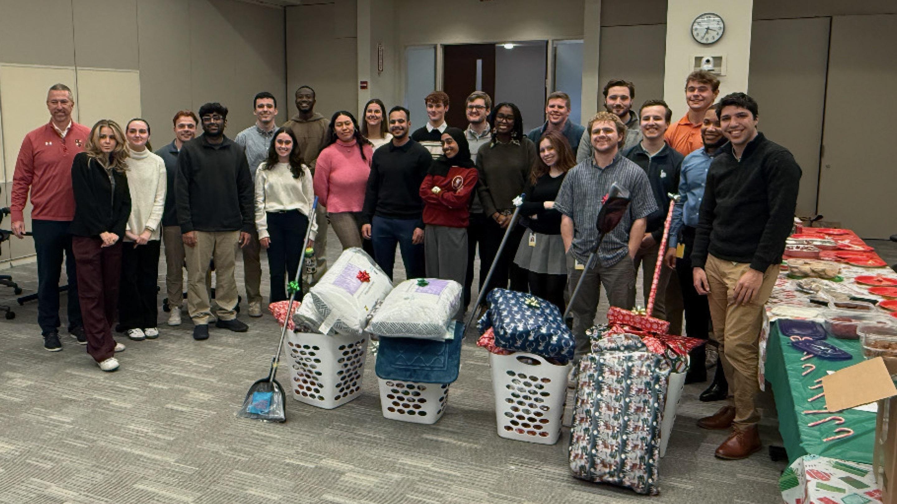 (slide 2 of 8) Rob Eliott of Liberty Mutual volunteering.